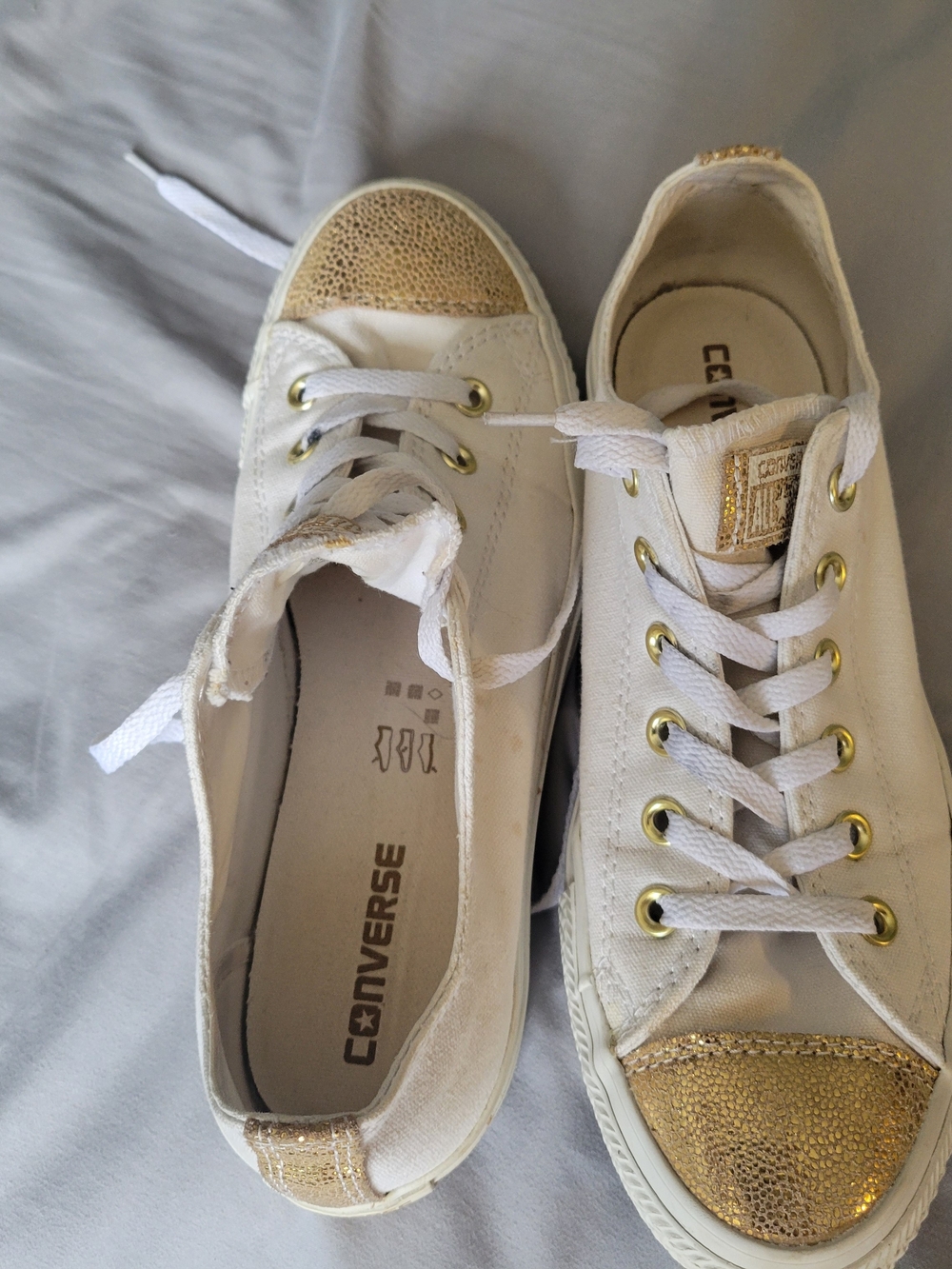 Converse Women’s White Sneakers with Gold Metallic Toe and Trim